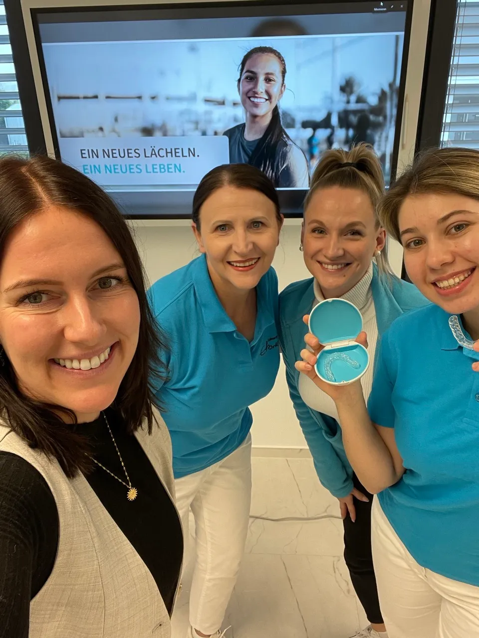 The team at ClearCorrect, with a case for the aligners