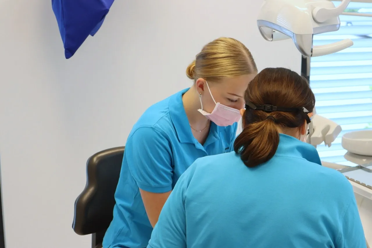 Two team members during treatment